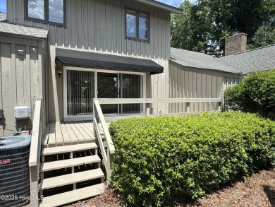 Welcome to easy living in this beautifully maintained 2-bedroom on Wilson Country Club in North Carolina - for sale on GolfHomes.com, golf home, golf lot