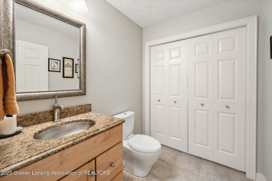 Stunning 3-4 bedroom, 3 bath one owner ranch style condo in the on Hawk Hollow Golf Course  in Michigan - for sale on GolfHomes.com, golf home, golf lot