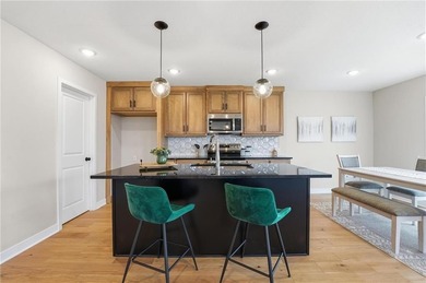 Come home to this attractive 4-bedroom, 3.5-bath two-story on Golf Club of Creekmoor in Missouri - for sale on GolfHomes.com, golf home, golf lot