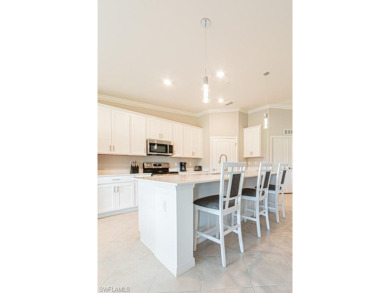 Experience Elevated Living in this Former Kodei Properties Model on  in Florida - for sale on GolfHomes.com, golf home, golf lot