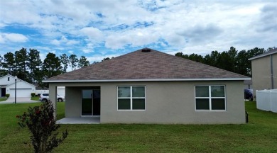 Welcome to this beautiful concrete block house in Lake Diamond on Lake Diamond Golf and Country Club in Florida - for sale on GolfHomes.com, golf home, golf lot