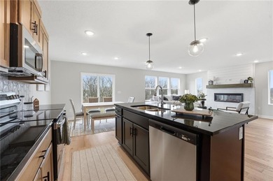 Come home to this attractive 4-bedroom, 3.5-bath two-story on Golf Club of Creekmoor in Missouri - for sale on GolfHomes.com, golf home, golf lot