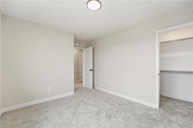 Come home to this attractive 4-bedroom, 3.5-bath two-story on Golf Club of Creekmoor in Missouri - for sale on GolfHomes.com, golf home, golf lot