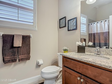 Immaculate, 3 bedroom, 2 bathroom home with water views and on Halifax Plantation Golf Club in Florida - for sale on GolfHomes.com, golf home, golf lot