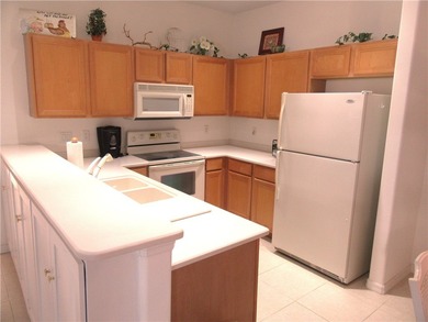 Cozy Pointe West villa home located in a superb location across on The Club At Pointe West in Florida - for sale on GolfHomes.com, golf home, golf lot