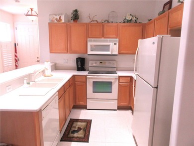 Cozy Pointe West villa home located in a superb location across on The Club At Pointe West in Florida - for sale on GolfHomes.com, golf home, golf lot