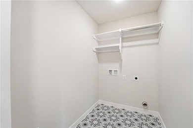 Come home to this attractive 4-bedroom, 3.5-bath two-story on Golf Club of Creekmoor in Missouri - for sale on GolfHomes.com, golf home, golf lot