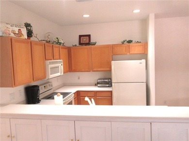 Cozy Pointe West villa home located in a superb location across on The Club At Pointe West in Florida - for sale on GolfHomes.com, golf home, golf lot