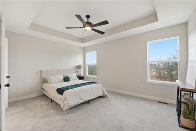 Come home to this attractive 4-bedroom, 3.5-bath two-story on Golf Club of Creekmoor in Missouri - for sale on GolfHomes.com, golf home, golf lot