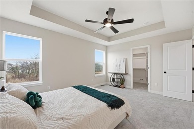 Come home to this attractive 4-bedroom, 3.5-bath two-story on Golf Club of Creekmoor in Missouri - for sale on GolfHomes.com, golf home, golf lot