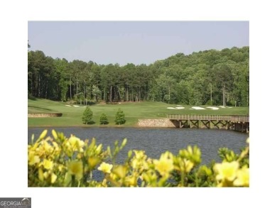 This extraordinary 1.40 +/- acre homesite offers captivating on Hawks Ridge Golf Club in Georgia - for sale on GolfHomes.com, golf home, golf lot