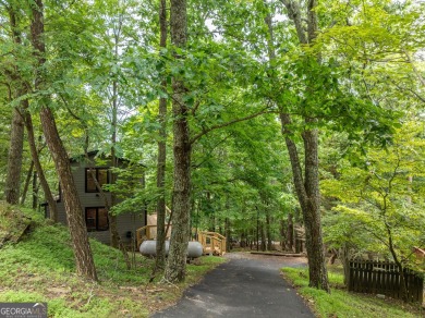 Welcome home to Cutthroat Ridge! Perched on a crest here you on Bent Tree Golf Course in Georgia - for sale on GolfHomes.com, golf home, golf lot