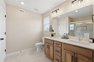 Come home to this attractive 4-bedroom, 3.5-bath two-story on Golf Club of Creekmoor in Missouri - for sale on GolfHomes.com, golf home, golf lot