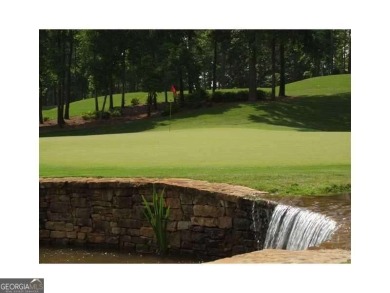 This extraordinary 1.40 +/- acre homesite offers captivating on Hawks Ridge Golf Club in Georgia - for sale on GolfHomes.com, golf home, golf lot