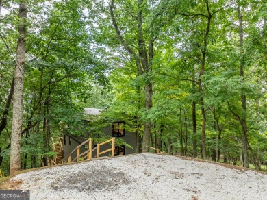 Welcome home to Cutthroat Ridge! Perched on a crest here you on Bent Tree Golf Course in Georgia - for sale on GolfHomes.com, golf home, golf lot