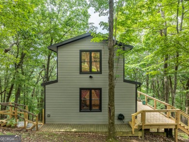 Welcome home to Cutthroat Ridge! Perched on a crest here you on Bent Tree Golf Course in Georgia - for sale on GolfHomes.com, golf home, golf lot