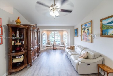 Stunning 4BR/4BA POOL HOME ideal for families and entertaining! on Sun n Lake Golf and Country Club in Florida - for sale on GolfHomes.com, golf home, golf lot