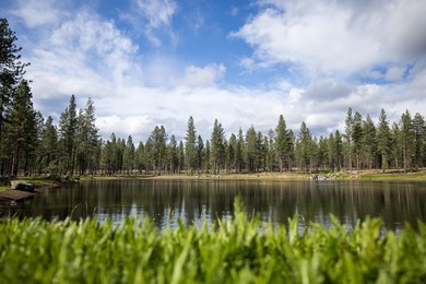 Stunning two level Aspen plan with water views.Time limited on Sunriver Caldera Springs Golf Course in Oregon - for sale on GolfHomes.com, golf home, golf lot