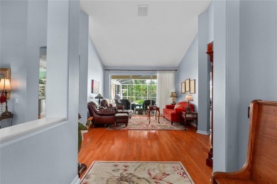 Discover a remarkable 4-bedroom, 3-bathroom pool home in the on Hunters Green Country Club in Florida - for sale on GolfHomes.com, golf home, golf lot