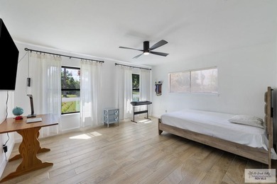 Beautiful 4-bedroom, 5-bath home on a resaca lot in Rancho on Rancho Viejo Resort and Country Club in Texas - for sale on GolfHomes.com, golf home, golf lot