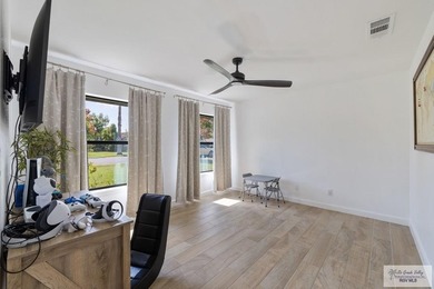Beautiful 4-bedroom, 5-bath home on a resaca lot in Rancho on Rancho Viejo Resort and Country Club in Texas - for sale on GolfHomes.com, golf home, golf lot