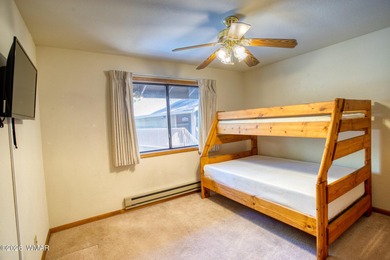 Perfectly located upper-level 3-bedroom, 2-bath condo in Sports on Pinetop Lakes Golf and Country Club in Arizona - for sale on GolfHomes.com, golf home, golf lot