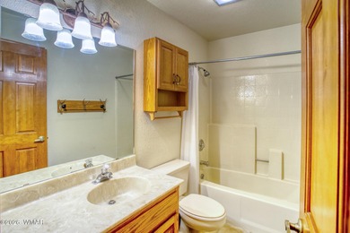 Perfectly located upper-level 3-bedroom, 2-bath condo in Sports on Pinetop Lakes Golf and Country Club in Arizona - for sale on GolfHomes.com, golf home, golf lot