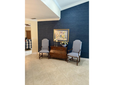 Nestled on a culdesac in the prestigious gated community of on The Wanderers Club in Florida - for sale on GolfHomes.com, golf home, golf lot