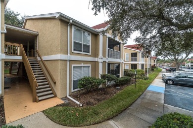 Exclusive First-Floor Condo in Hunter's Green Golf & Gate on Hunters Green Country Club in Florida - for sale on GolfHomes.com, golf home, golf lot