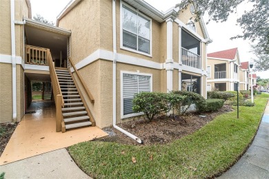 Exclusive First-Floor Condo in Hunter's Green Golf & Gate on Hunters Green Country Club in Florida - for sale on GolfHomes.com, golf home, golf lot