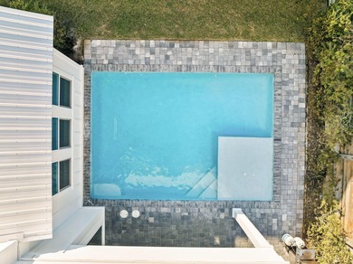 Welcome to 147 Charlotte Avenue, a next to new coastal retreat on Seascape Golf Course in Florida - for sale on GolfHomes.com, golf home, golf lot