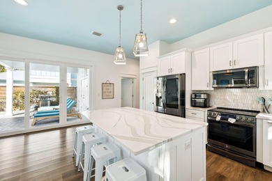 Welcome to 147 Charlotte Avenue, a next to new coastal retreat on Seascape Golf Course in Florida - for sale on GolfHomes.com, golf home, golf lot