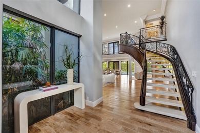 Hidden gem in Emerald Hills where prestige meets privacy on The Club at Emerald Hills in Florida - for sale on GolfHomes.com, golf home, golf lot