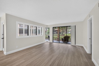 Enjoy effortless living in this beautifully remodeled 2-bedroom on PGA National Golf Club in Florida - for sale on GolfHomes.com, golf home, golf lot