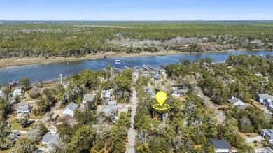 Discover a rare opportunity to own a beautiful wooded homesite on Founders Club At St. James Plantation in North Carolina - for sale on GolfHomes.com, golf home, golf lot