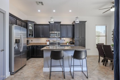 This beautifully maintained 3-bedroom, 2-bath home with a on Estrella Mountain Ranch Golf Course in Arizona - for sale on GolfHomes.com, golf home, golf lot