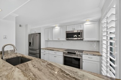 Enjoy effortless living in this beautifully remodeled 2-bedroom on PGA National Golf Club in Florida - for sale on GolfHomes.com, golf home, golf lot