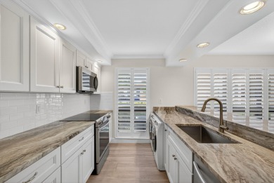 Enjoy effortless living in this beautifully remodeled 2-bedroom on PGA National Golf Club in Florida - for sale on GolfHomes.com, golf home, golf lot