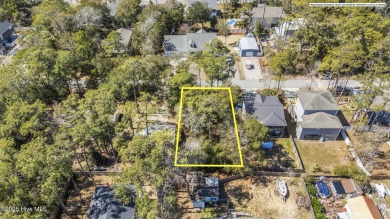 Discover a rare opportunity to own a beautiful wooded homesite on Founders Club At St. James Plantation in North Carolina - for sale on GolfHomes.com, golf home, golf lot