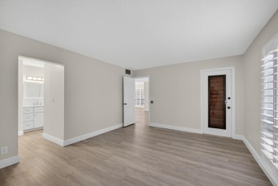 Enjoy effortless living in this beautifully remodeled 2-bedroom on PGA National Golf Club in Florida - for sale on GolfHomes.com, golf home, golf lot