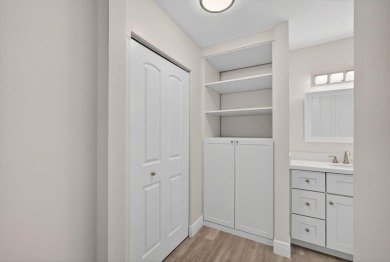 Enjoy effortless living in this beautifully remodeled 2-bedroom on PGA National Golf Club in Florida - for sale on GolfHomes.com, golf home, golf lot