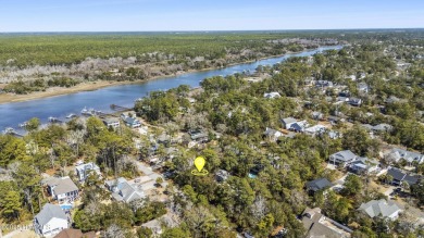 Discover a rare opportunity to own a beautiful wooded homesite on Founders Club At St. James Plantation in North Carolina - for sale on GolfHomes.com, golf home, golf lot