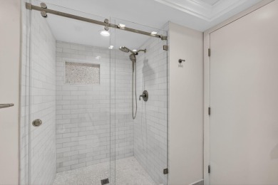 Enjoy effortless living in this beautifully remodeled 2-bedroom on PGA National Golf Club in Florida - for sale on GolfHomes.com, golf home, golf lot