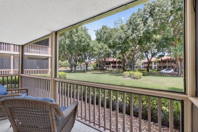 Enjoy effortless living in this beautifully remodeled 2-bedroom on PGA National Golf Club in Florida - for sale on GolfHomes.com, golf home, golf lot