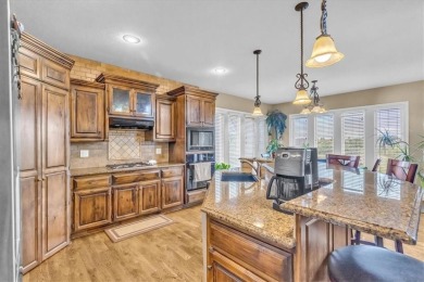 Welcome to this stunning 6-bedroom, 5.1-bathroom estate offering on Golf Club of Creekmoor in Missouri - for sale on GolfHomes.com, golf home, golf lot