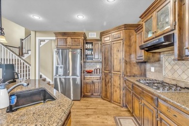 Welcome to this stunning 6-bedroom, 5.1-bathroom estate offering on Golf Club of Creekmoor in Missouri - for sale on GolfHomes.com, golf home, golf lot