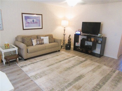 Clean and bright FIRST FLOOR 2/2 condo in wooded golf community on Vero Beach South Golf Course in Florida - for sale on GolfHomes.com, golf home, golf lot