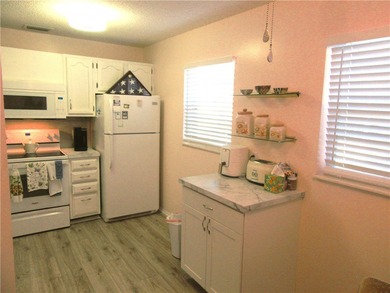 Clean and bright FIRST FLOOR 2/2 condo in wooded golf community on Vero Beach South Golf Course in Florida - for sale on GolfHomes.com, golf home, golf lot