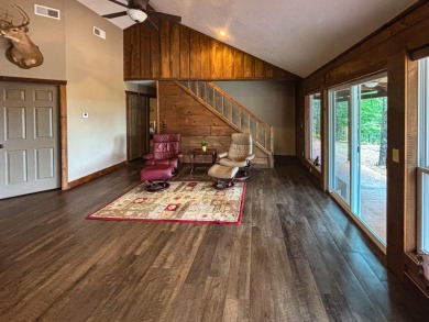 This 3 bedroom, 3 bath home sits on 6 lots in Country Club Hills on Lost Woods Golf Course in Missouri - for sale on GolfHomes.com, golf home, golf lot