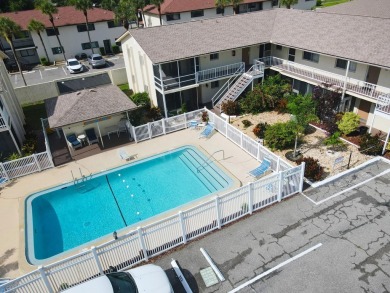 Rarely available ground floor end unit. Easy access to Sharkey's on Lake Venice Golf Club in Florida - for sale on GolfHomes.com, golf home, golf lot